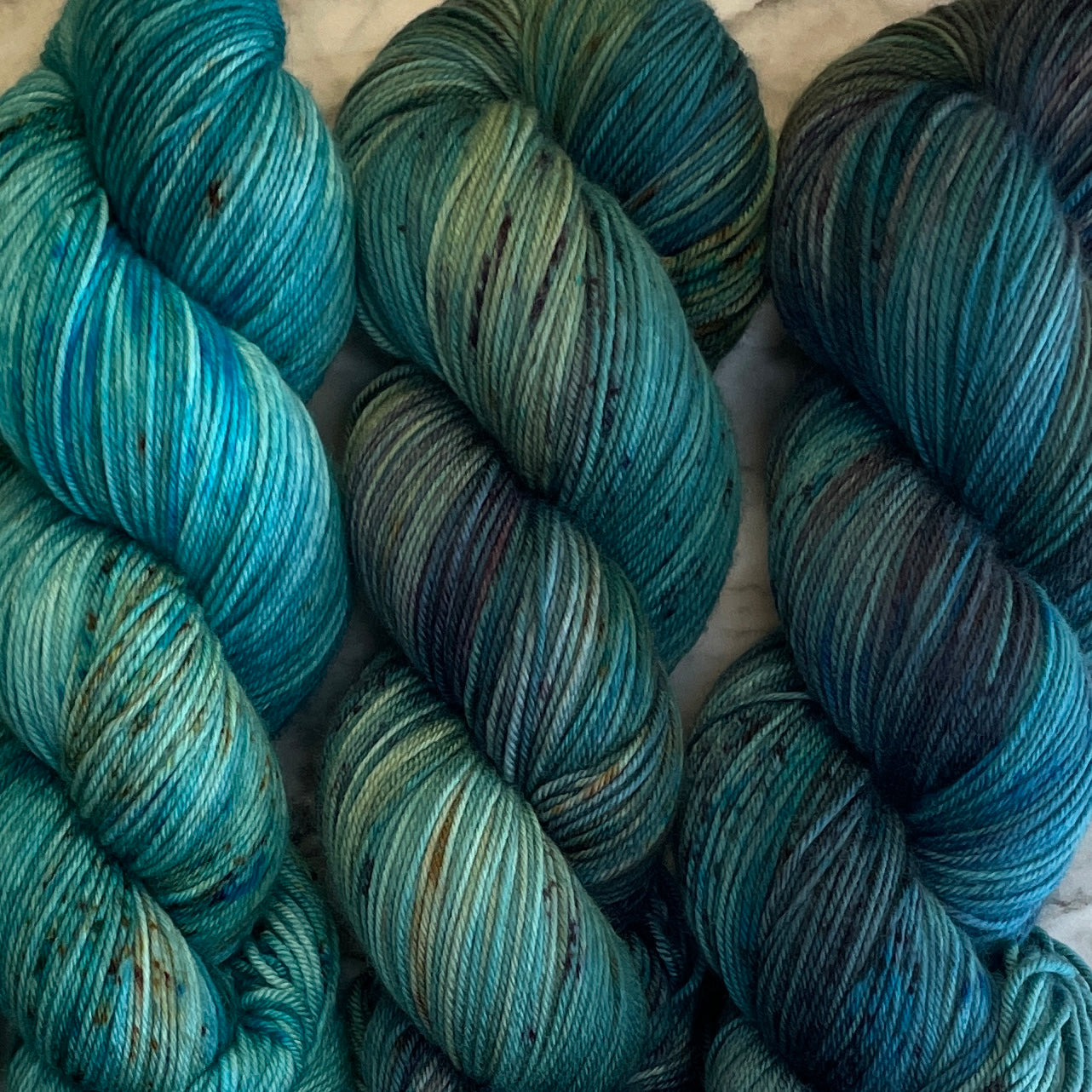 Mesmerizing Mermaid Shawl by Stephen West, 5 Full Skein Fade on Aussie Extra Fine Fingering & 1 Mermaid Stitch Marker