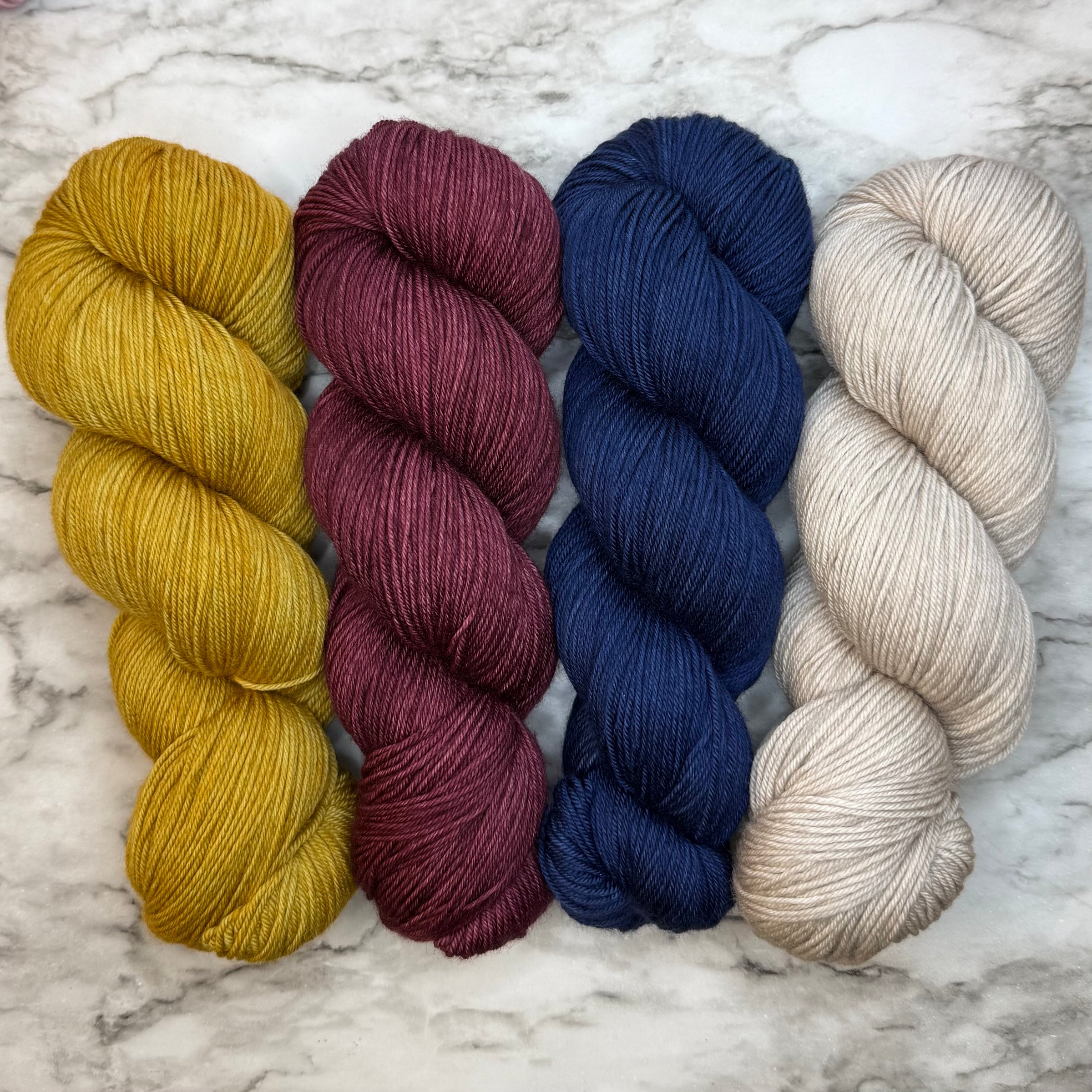 Believe: An MKAL the Lasso Way by Lyrical Knits “Beard’s Magic Trousers” Set on Aussie Extra Fine Fingering + 1 Themed Stitch Marker *Pattern NOT Included* All preorders will ship out February 17th