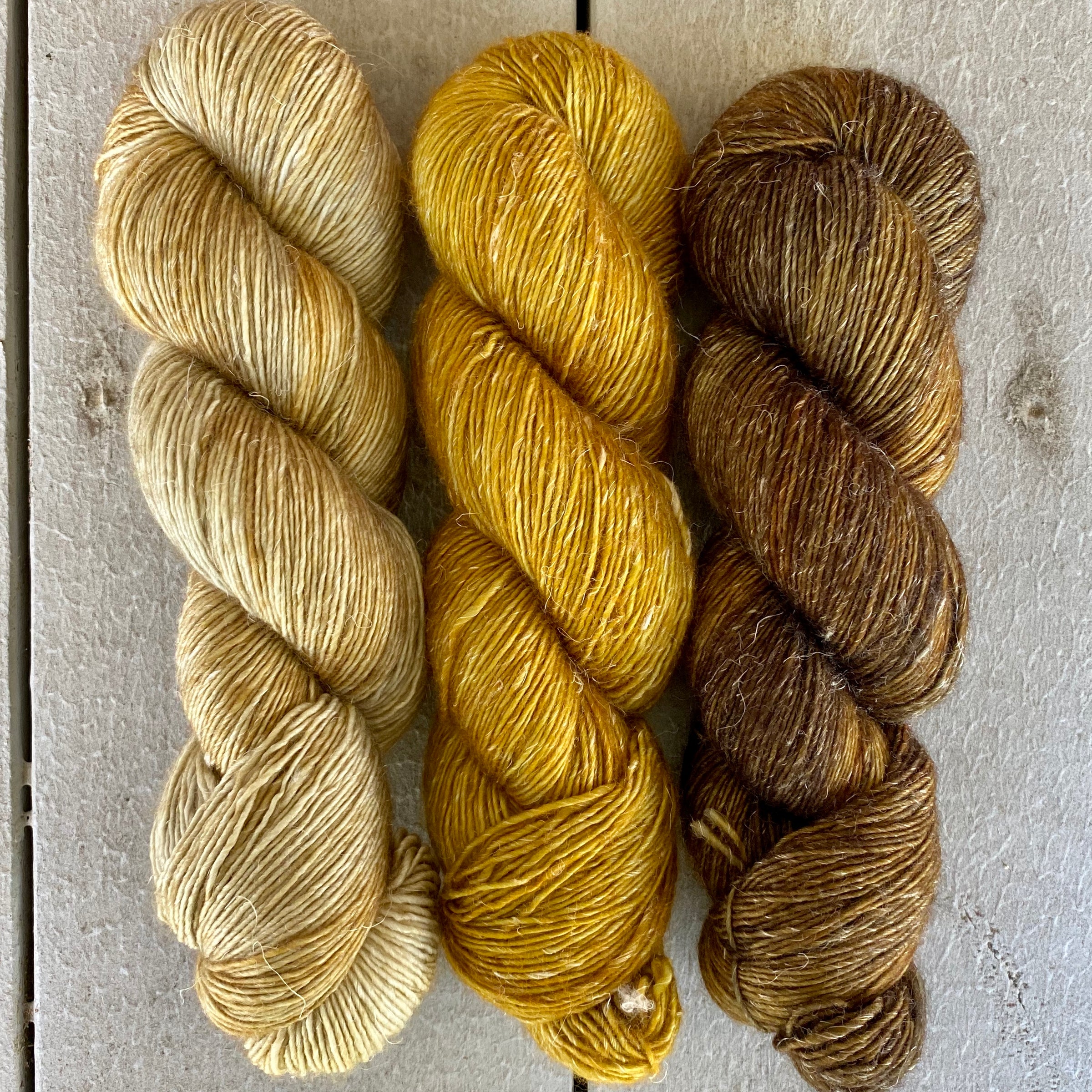 Trio of Merino Linen (fingering weight), Wheat, Ochre & Oil Rubbed Bronze