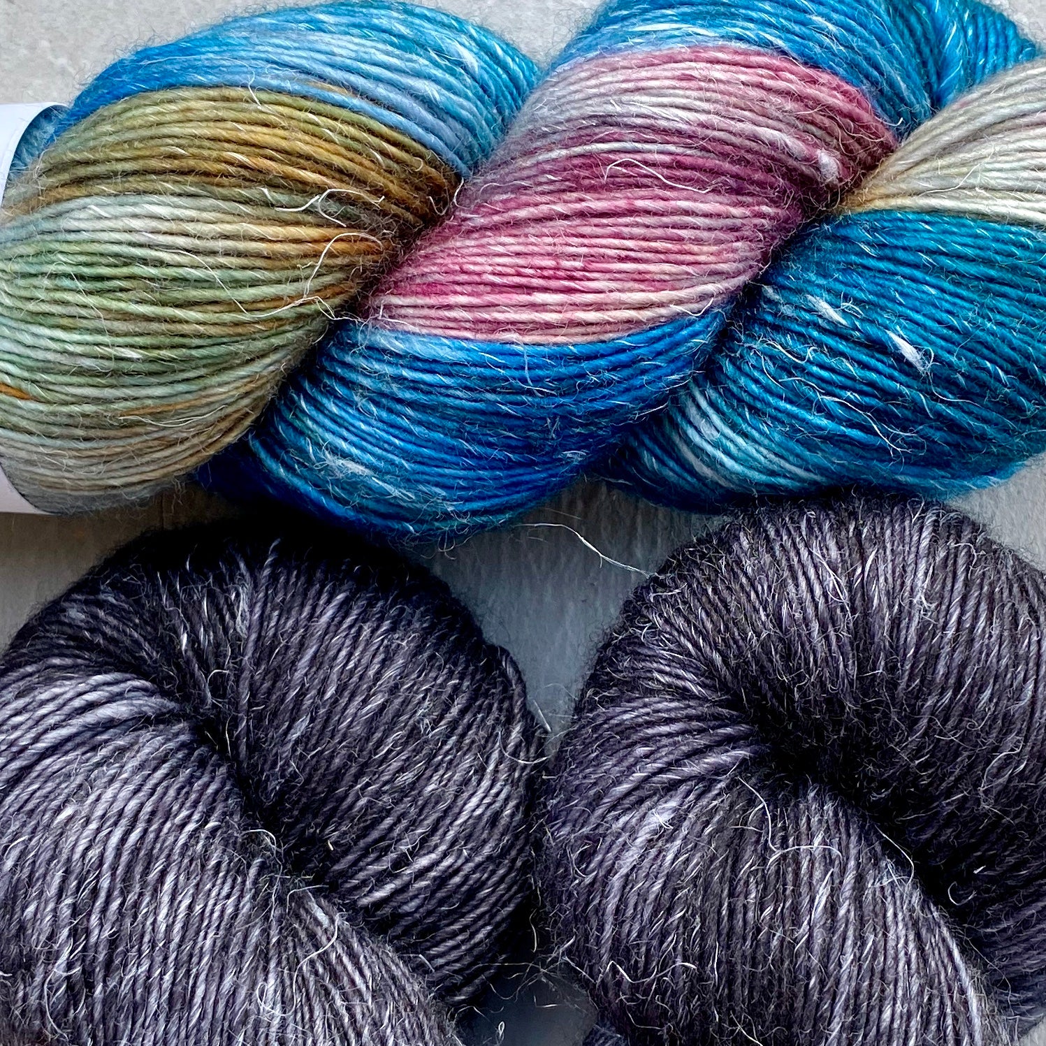 Misurina or Trelawny Top (Both are Crop Tees) Yarn in Noir & Boutique, Merino Linen (fingering weight)